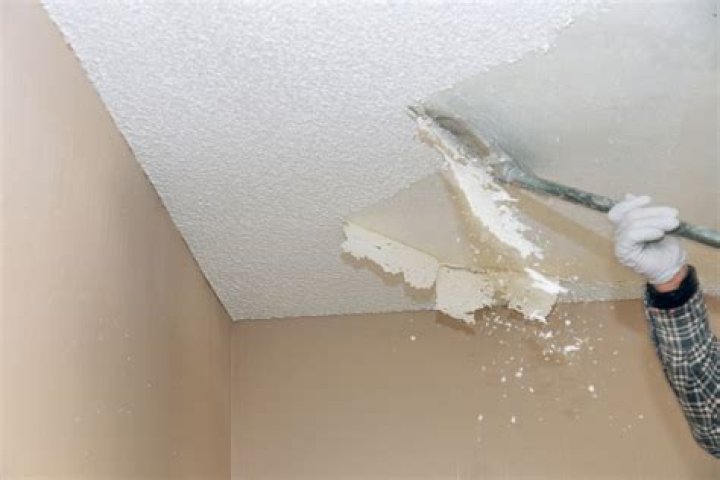 How do I remove texture from a painted ceiling?