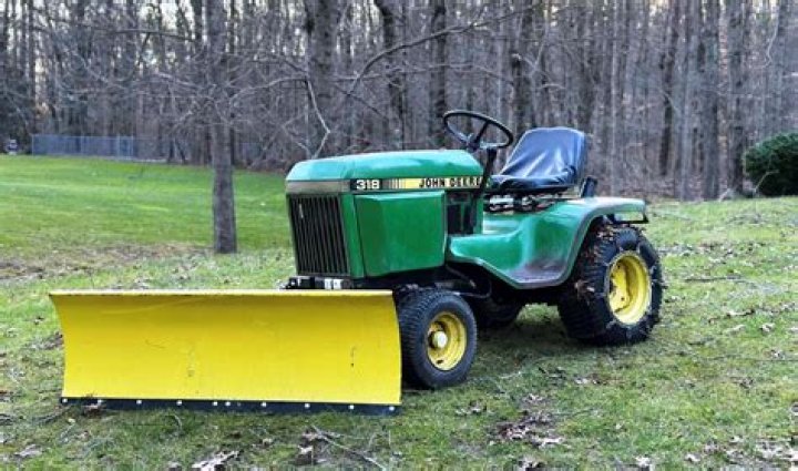 How do I tell what year my John Deere 318 is?