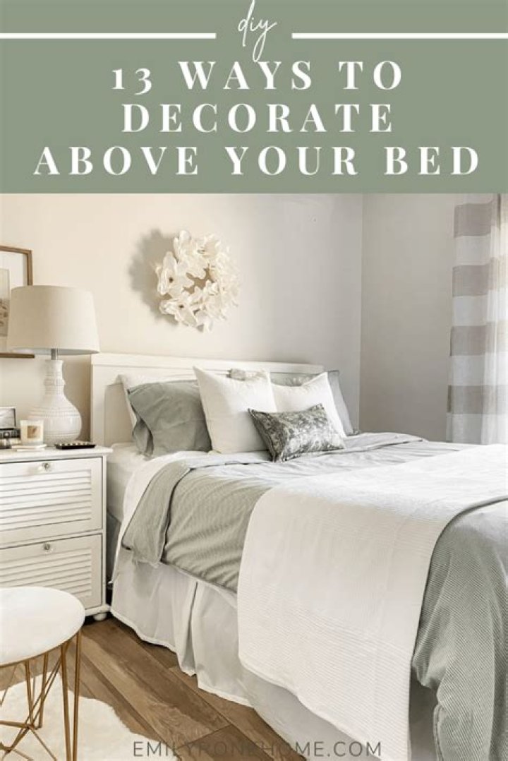 How do you decorate a wall above a bed?