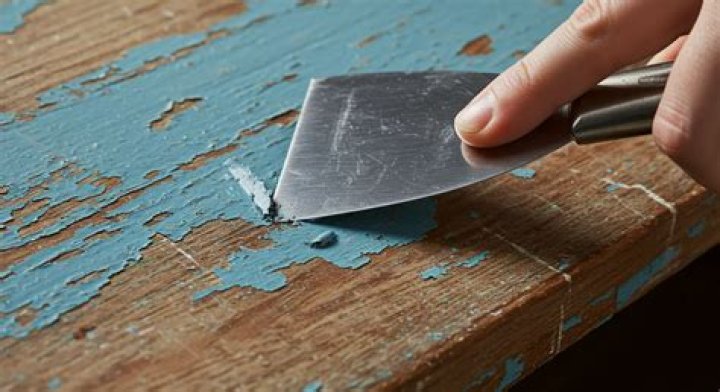 How do you get paint off wood paneling?