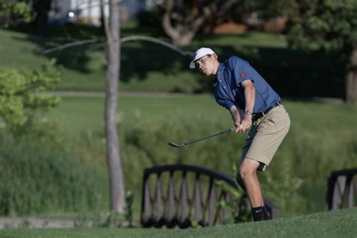 How much does a high school golf coach make?